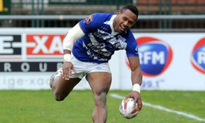 Toulouse Olympique winger Kuni Minga touches the ball down for a try.