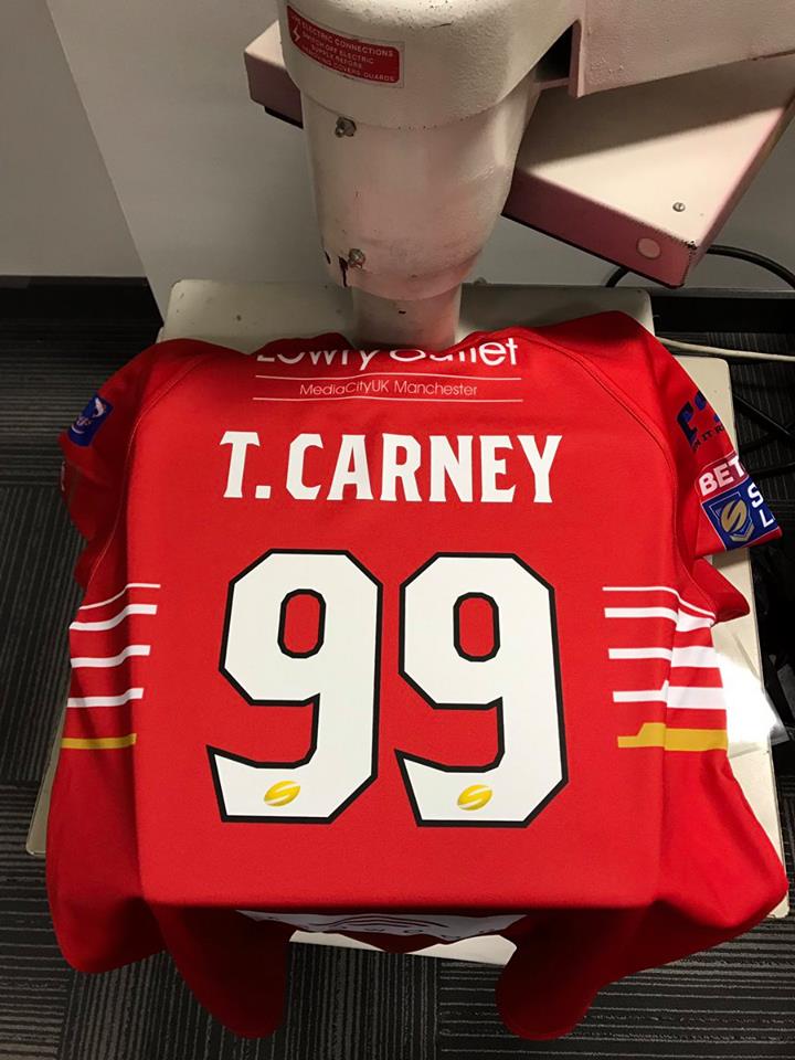 Carney given strange squad number