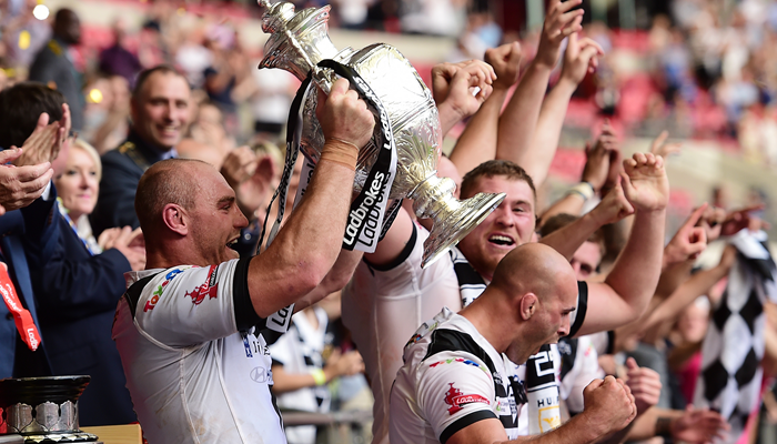 Hull FC captain Gareth Ellis lifts the Ladbrokes Challenge Cup after Hull FC's 12-10 victory over Warrington Wolves at Wembley Stadium.