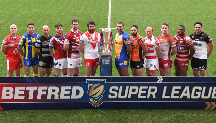 A player from all 12 Super League teams lines up at the 2017 launch.