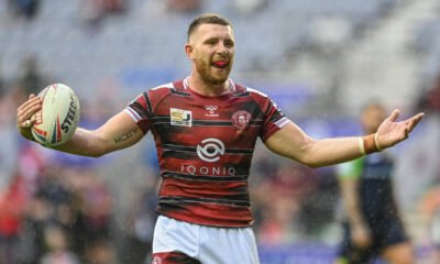 Jackson Hastings (31) of Wigan Warriors apples to referee Marcus Griffiths