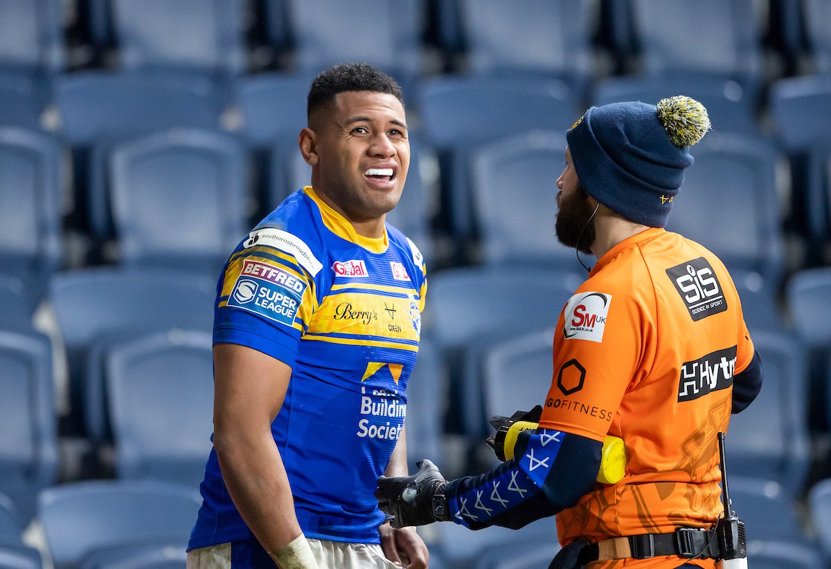 Leeds Rhinos star David Fusitu'a and a water carrier.
