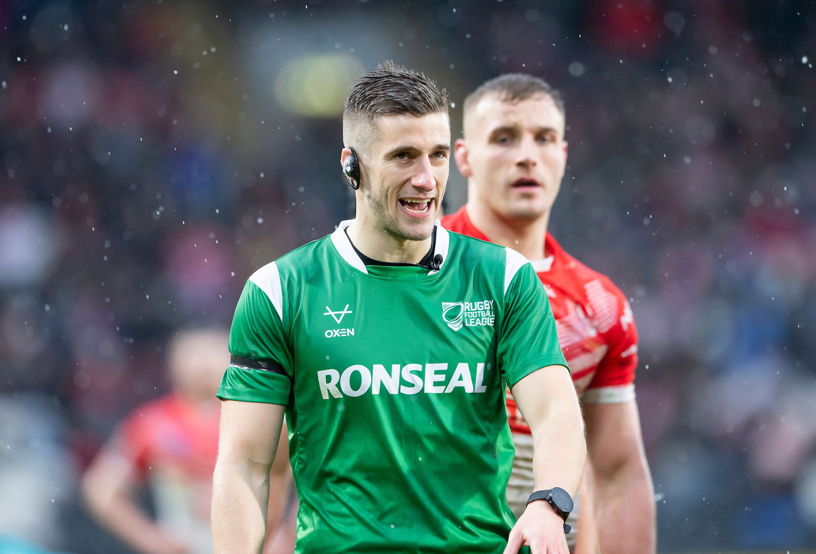 Chris Kendall, referee. Wearing a green shirt with Ronseal and Oxen branding.