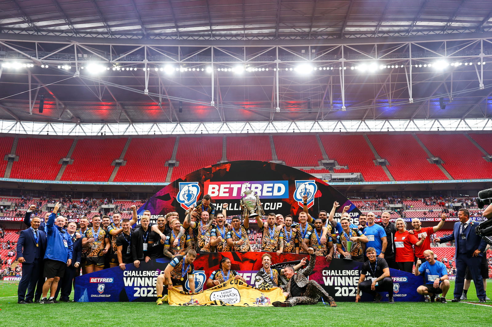 Leigh Leopards lift the Challenge Cup trophy after victory over Hull Kingston Rovers in the final