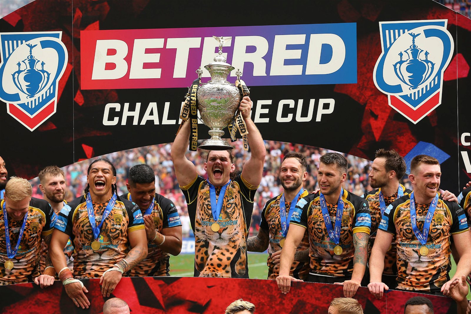 Leigh Leopards prop forward Robbie Mulhern lifts the Challenge Cup Trophy during the Rugby League Challenge Cup Final match between Hull Kingston Rovers and Leigh Leopards at Wembley Stadium.