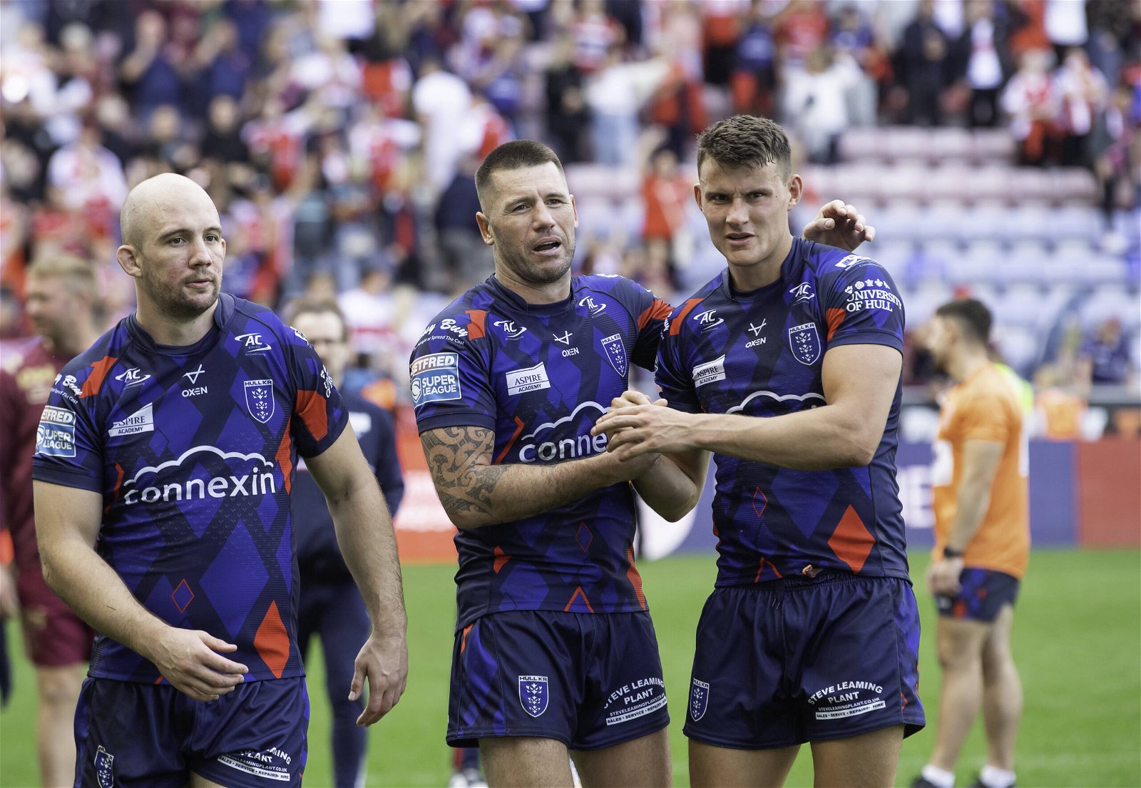 Hull KR players George King, Shaun Kenny-Dowall and Louis Senior after a Super League loss to Wigan Warriors.