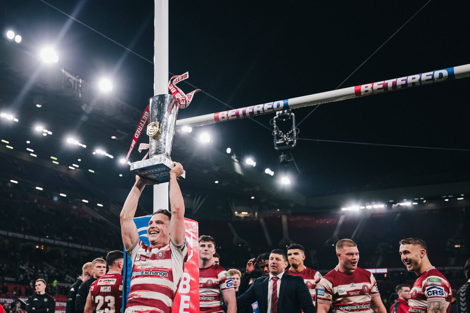 Wigan Warriors star Jai Field celebrates with the Super League trophy.