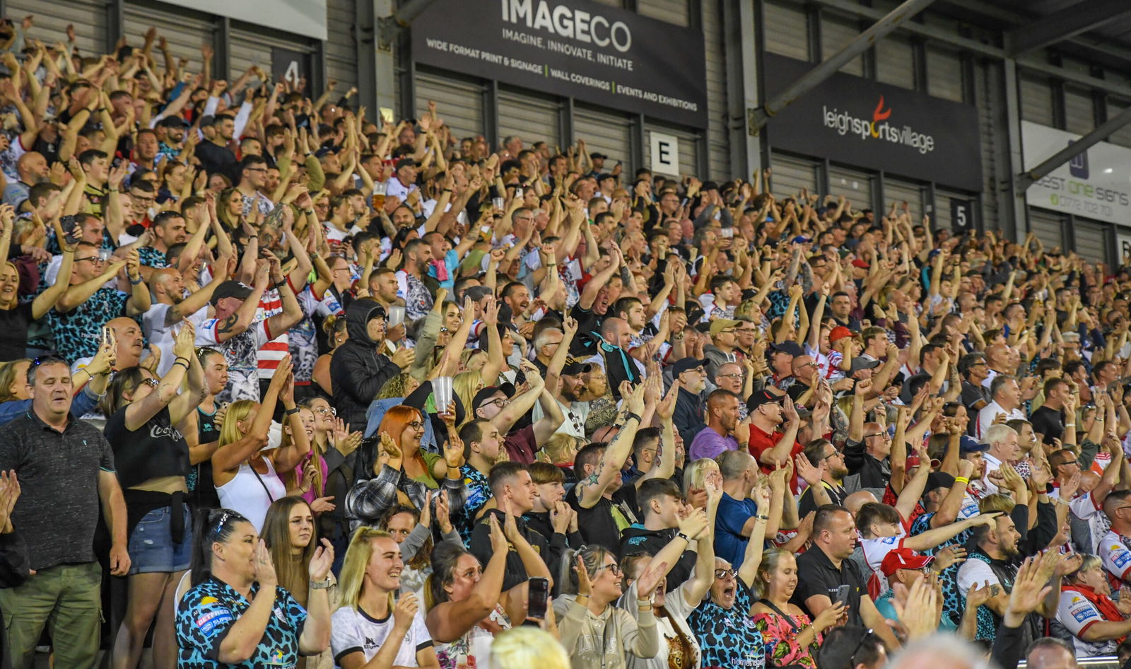 Leigh fans celebrate.