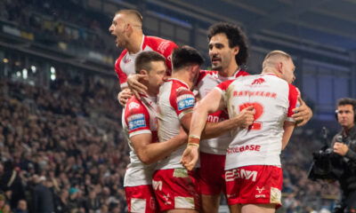 Hull KR players Mikey Lewis, Tom Opacic and Tyrone May celebrating a Niall Evalds try