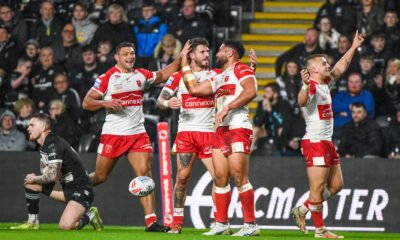 Hull KR Kelepi Tanginoa celebrateing his try with Hull KR s Mikey Lewis and Oliver Gildart