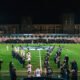 London Broncos and Catalans Dragons players walk out at Plough Lane in Wimbledon for Super League action.