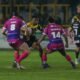 Castleford Tigers player Sylvester Namo is tackled against Wigan Warriors. He faced intense Super League disciplinary action.