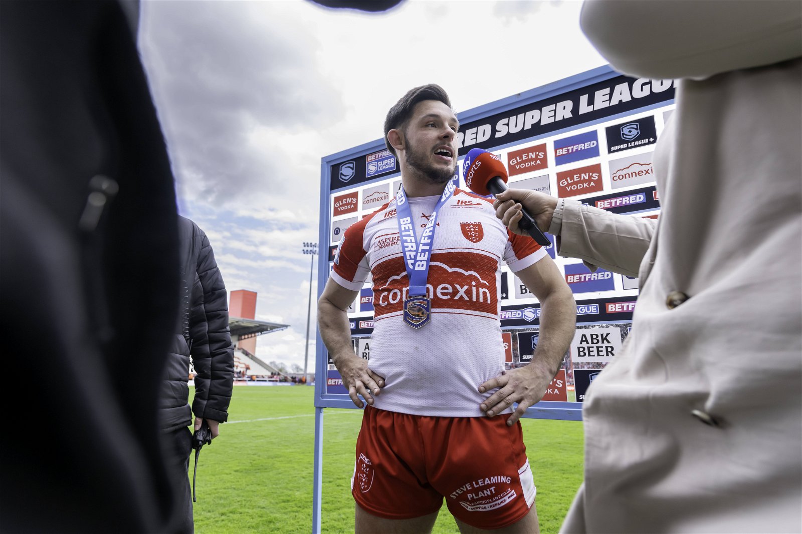 Hull KR's Niall Evalds being interviewed after a Super League victory over Hull FC. Being Player of the Match, he has a medal on.