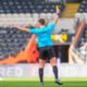 Super League Disciplinary: Referee Tom Grant showing Jack Brown of Hull FC the yellow card