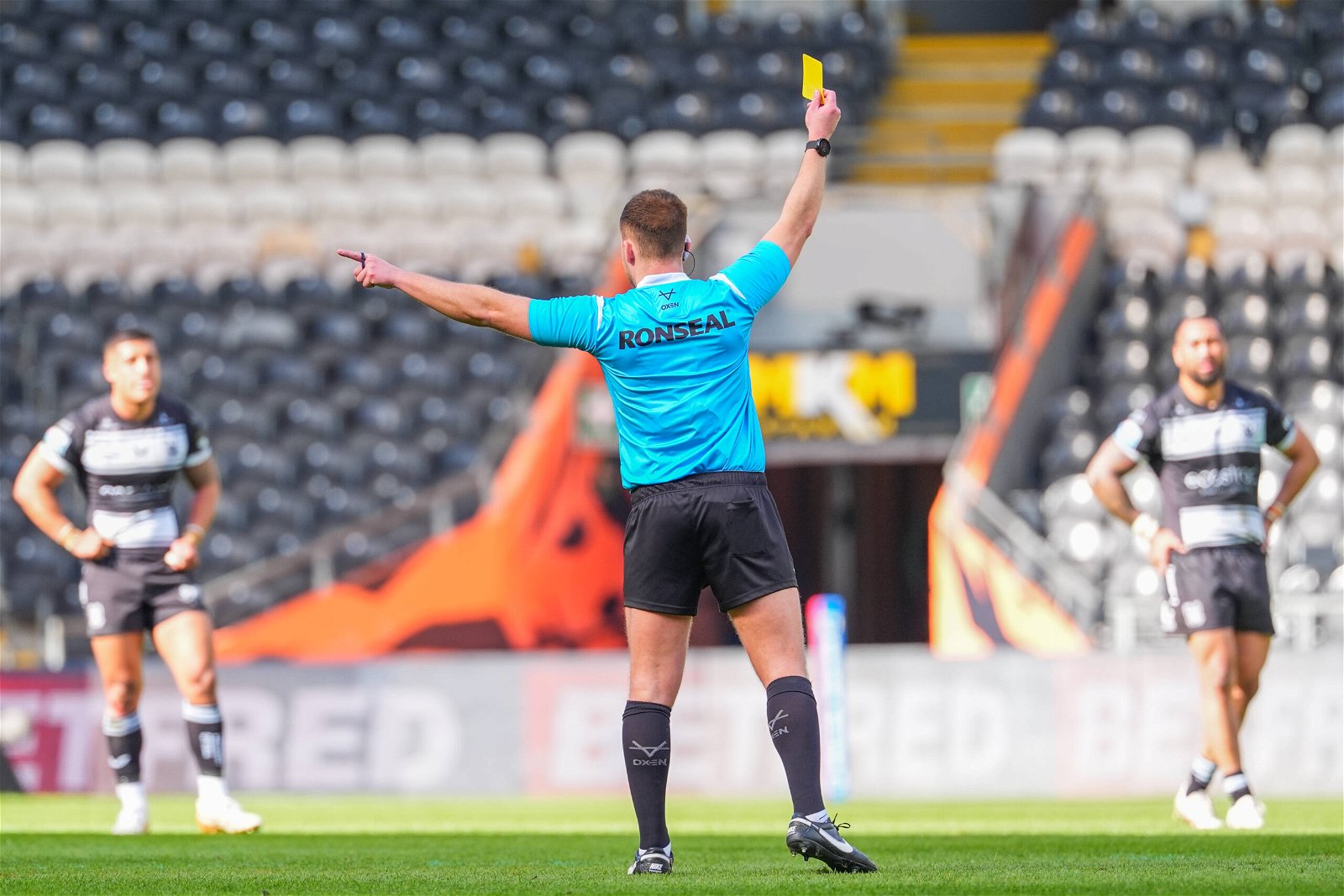 Super League Disciplinary: Referee Tom Grant showing Jack Brown of Hull FC the yellow card