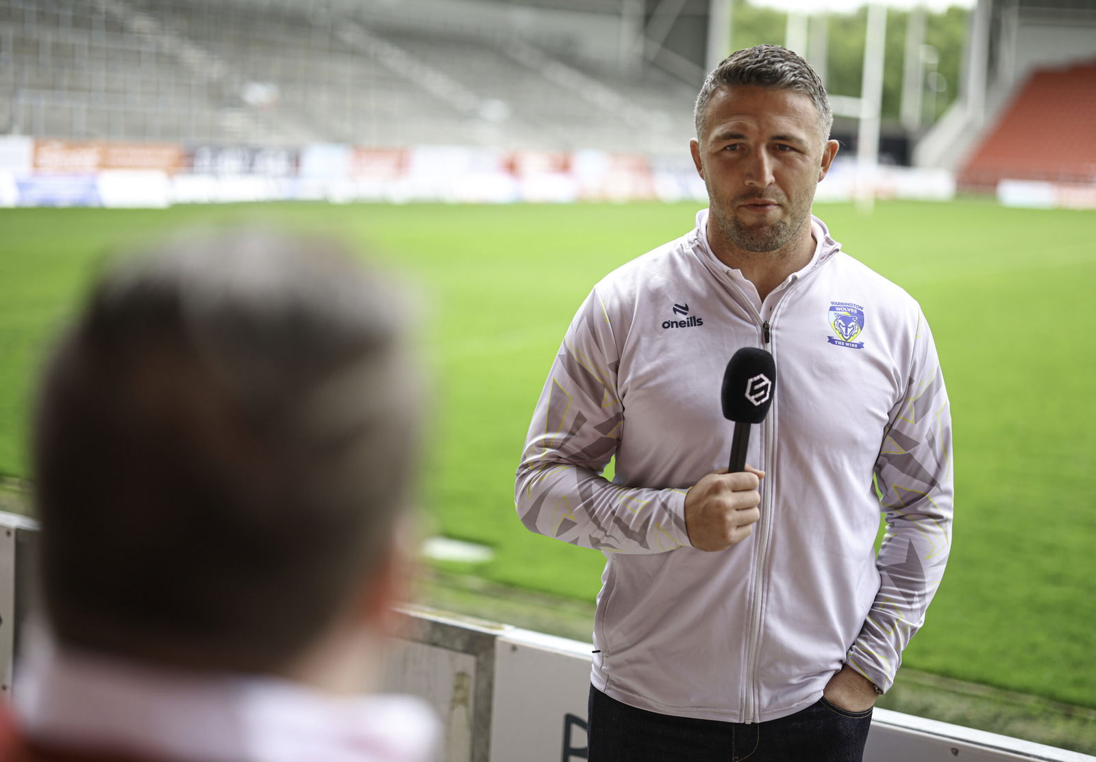 Warrington Wolves head coach Sam Burgess speaks to the media at St Helens