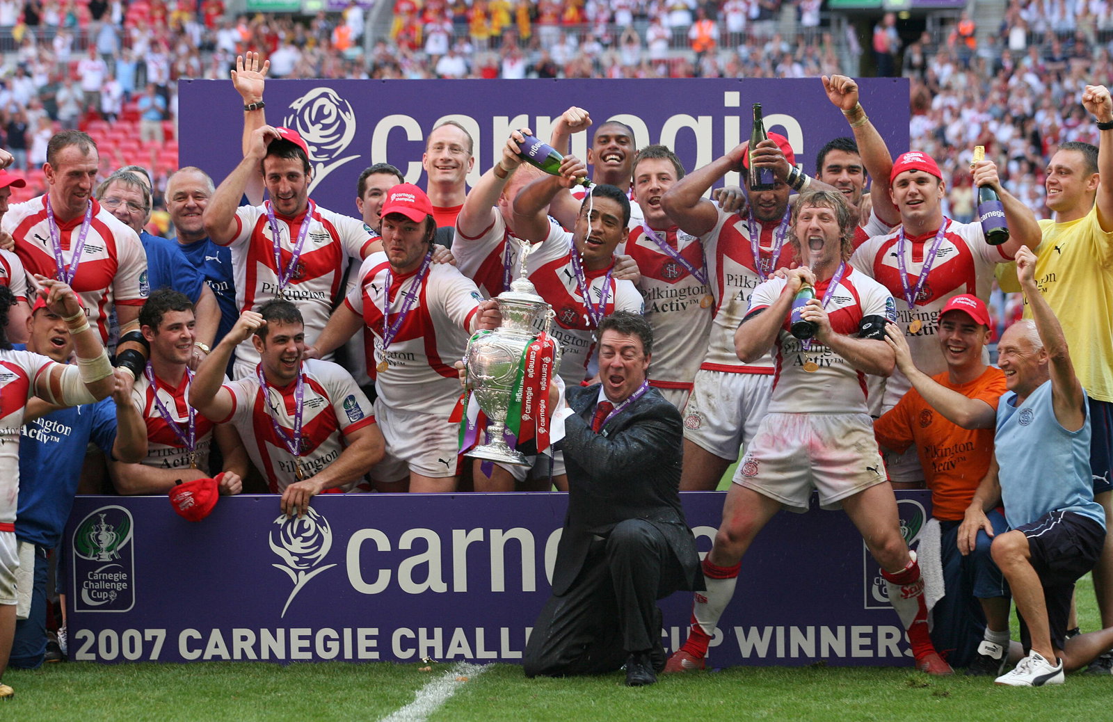 St Helens lift the 2007 Challenge Cup trophy.
