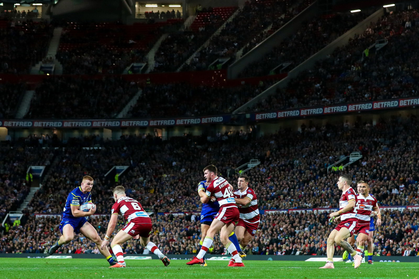 Wigan Warriors take on Warrington Wolves in the 2018 Grand Final