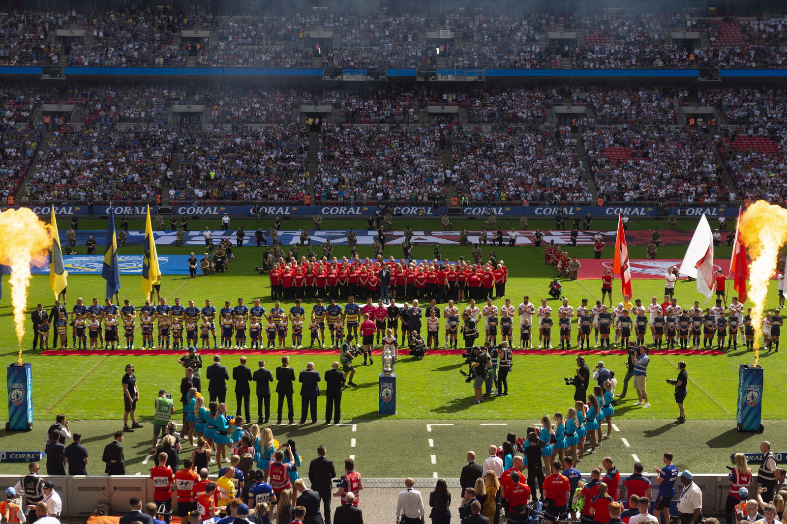 Players line up at Wembley Stadium for a Challenge Cup final.