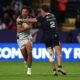 Dom Young of England is tackled by Arthur Romano of France England v France, Rugby League World Cup 2021