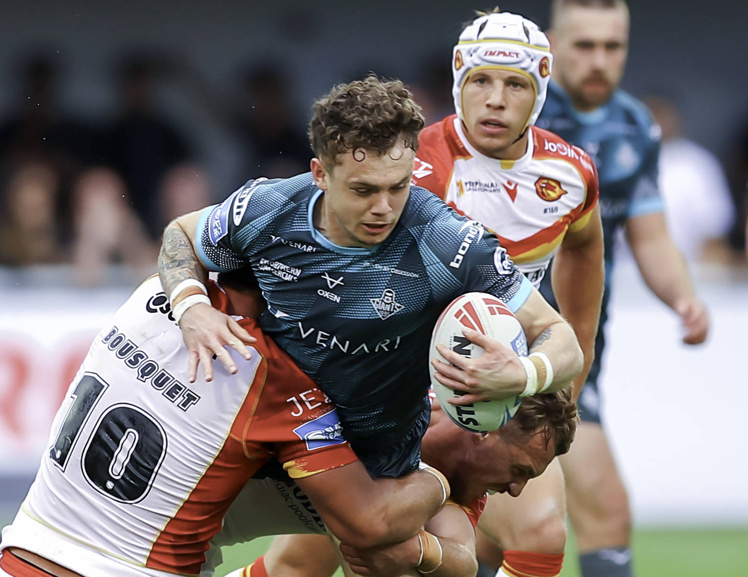 Elliot Wallis tackled in Catalans Dragons v Huddersfield Giants, a game full of Super League disciplinary drama.