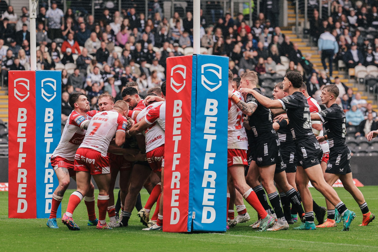 Picture by Alex Whitehead/SWpix.com - 13/07/2024 - Rugby League - Betfred Super League: Round 17 - Hull FC vs Hull KR - MKM Stadium, Hull, England - Both sets of players clash after an altercation between Brad Fash by Hull FC and Elliot Minchella of Hull KR