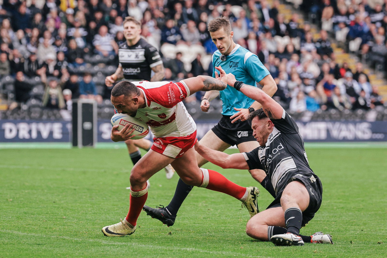 Elliot Minchella breaks away to score against Hull FC.