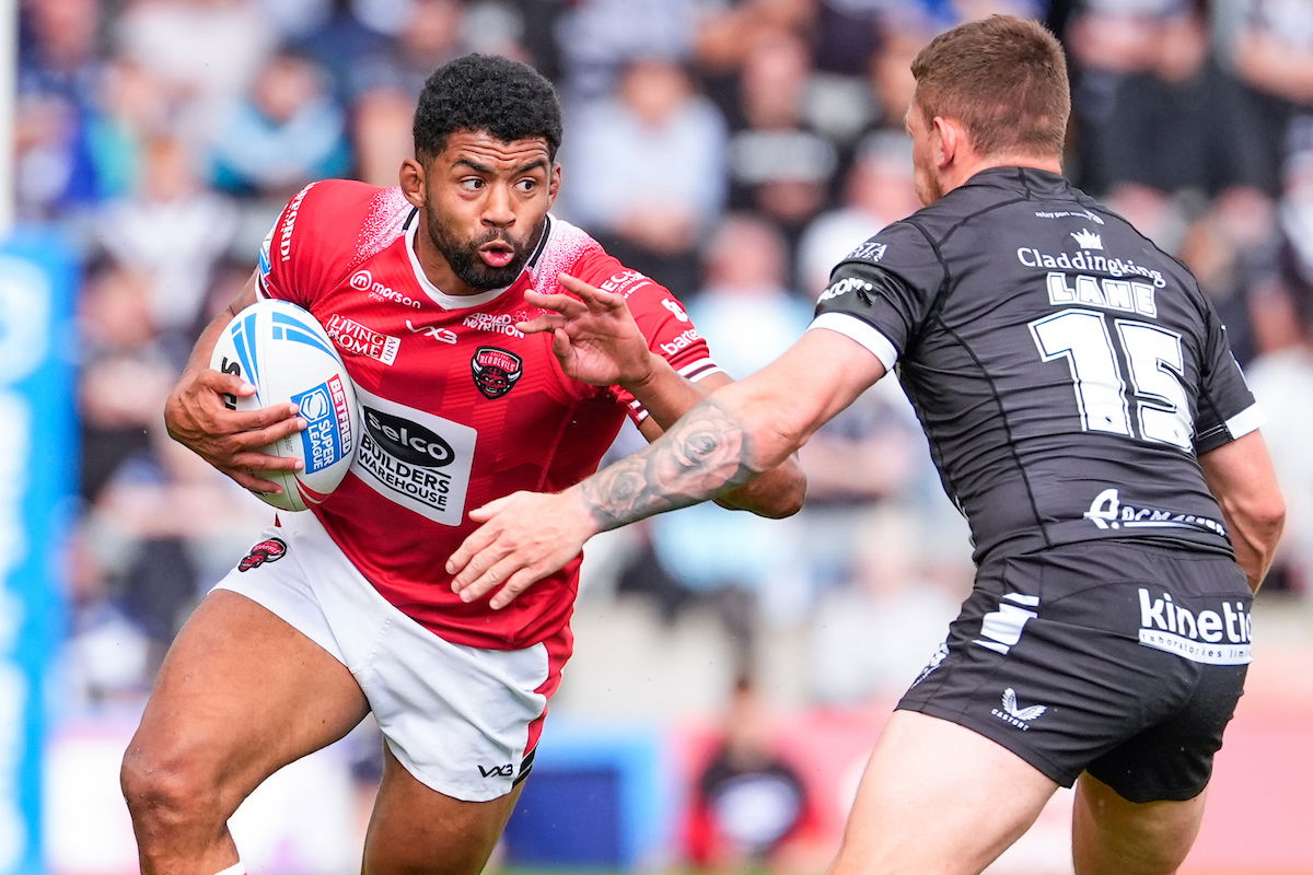 - 07/07/2024 - Rugby League - Betfred Super League Round 16 - Salford Red Devils v Hull FC - Salford Stadium, Eccles, England - Kallum Watkins of Salford is tackled by Jordan Lane of Hull FC