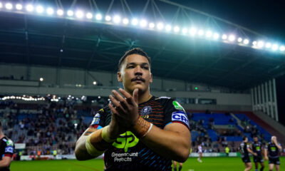 Wigan Warriors - 06/09/2024 - Rugby League - Betfred Super League Round 25 - Wigan Warriors v Hull KR - the Brick Community Stadium, Wigan, England - Tyler Dupree of Wigan celebrates his teams victory over Hull KR to put them at the top of the Betfred Super League table
