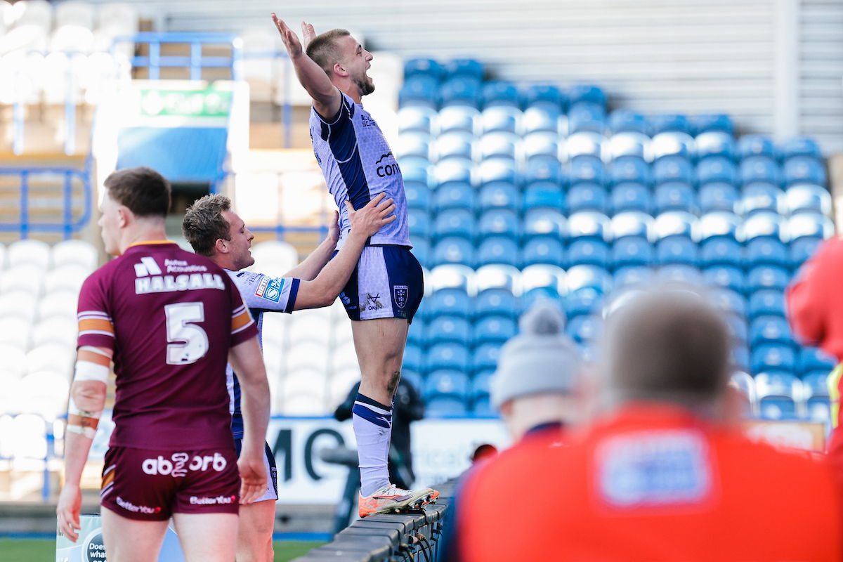 Hull KR star Mikey Lewis celebrates a try