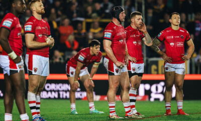 Salford Red Devils boss Paul Rowley as his side look on