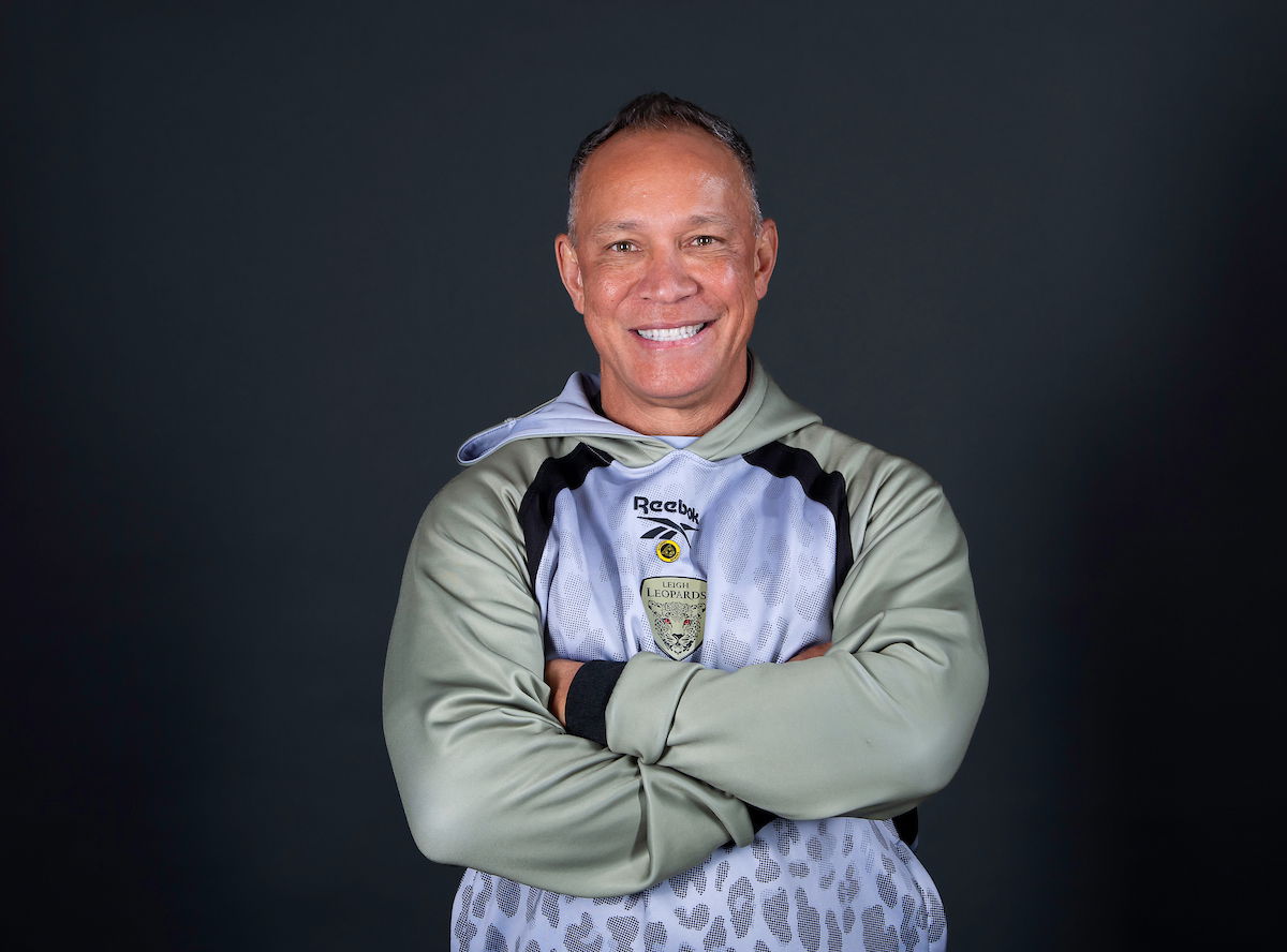 Leigh Leopards boss Adrian Lam posing with his arms folded