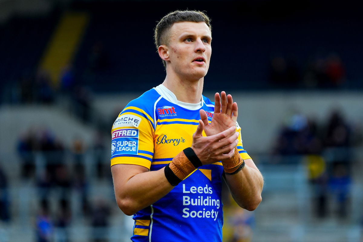 Leeds Rhinos captain Ash Handley applauds the fans