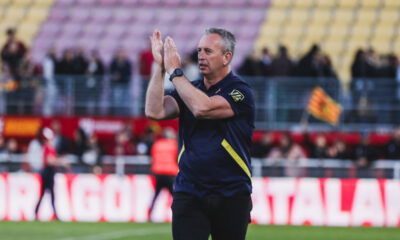 Catalans Dragons boss Steve McNamara applauds the fans