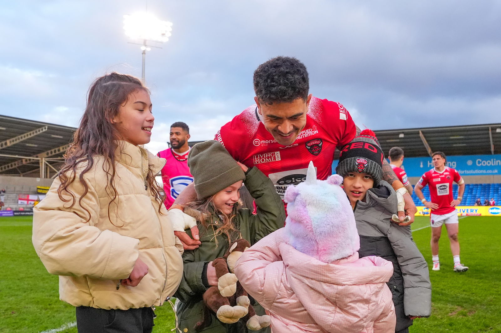 - 25/02/2024 - Rugby League - Betfred Super League Round 2 - Salford Red Devils v Castleford Tigers - Salford Stadium, Eccles, England - Salford's Tim Lafai with family after his sides victory over Castleford