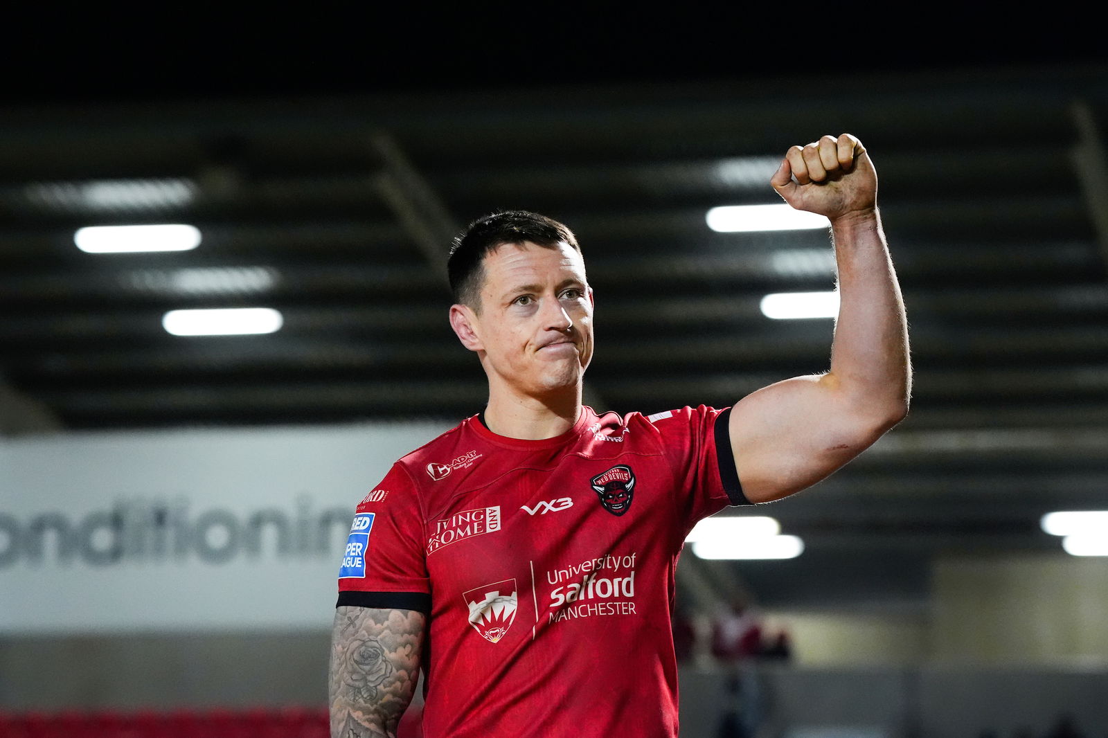 - 20/03/2025 - Rugby League - Betfred Super League Round 5 - Salford Red Devils v Huddersfield Giants - Salford Community Stadium, Eccles, England - Deon Cross of Salford celebrates his teams victory over Huddersfield