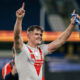 St Helens star Jack Welsby celebrates player of the match medal