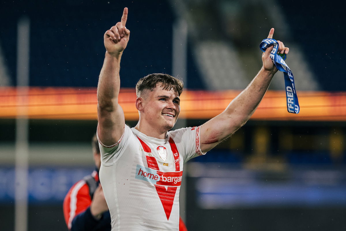 St Helens star Jack Welsby celebrates player of the match medal