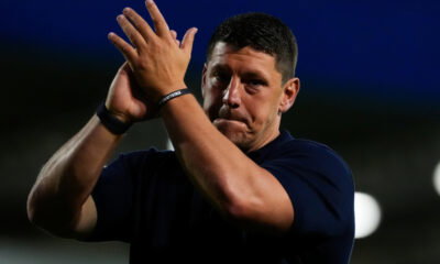 Wigan Warriors coach Matt Peet applauds travelling support