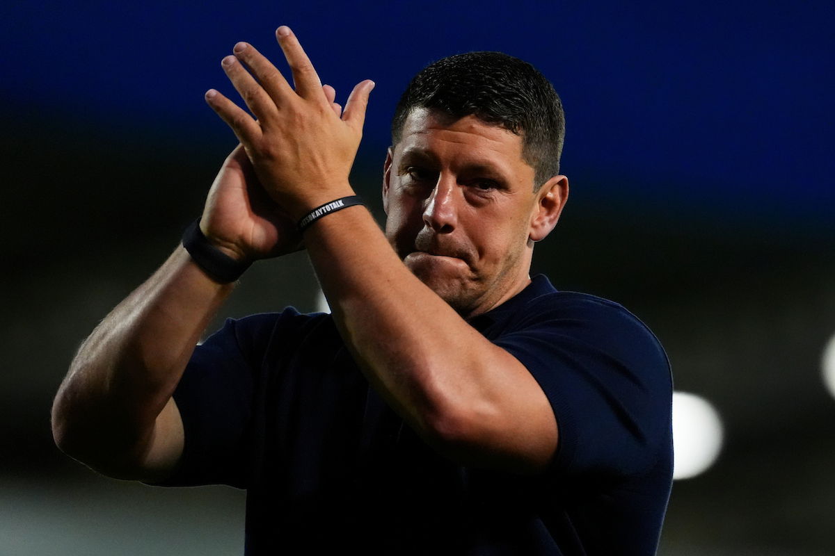 Wigan Warriors coach Matt Peet applauds travelling support