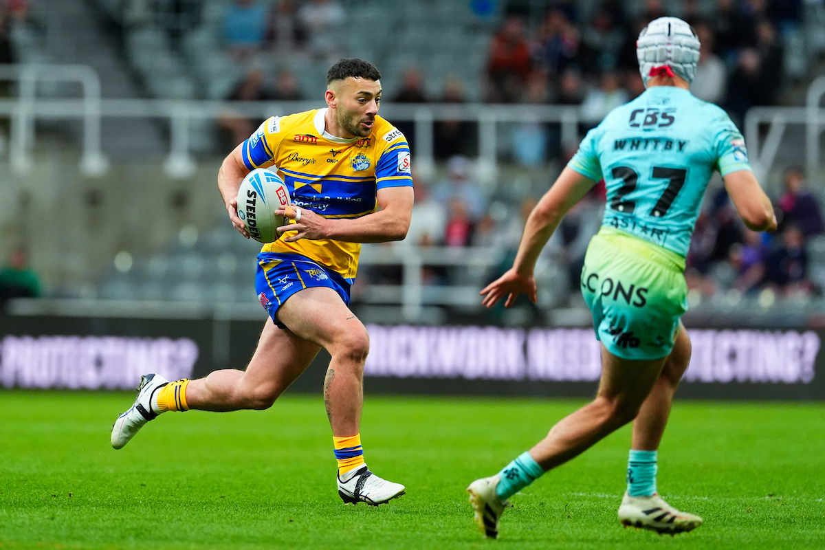 Leeds Rhinos halfback Jake Connor carrying the ball
