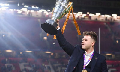 International rugby league as England wheelechair player Tom Halliwell lifts the trophy
