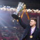 International rugby league as England wheelechair player Tom Halliwell lifts the trophy