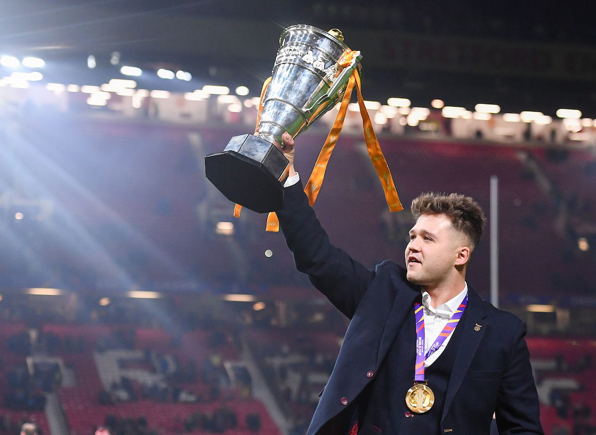 International rugby league as England wheelechair player Tom Halliwell lifts the trophy