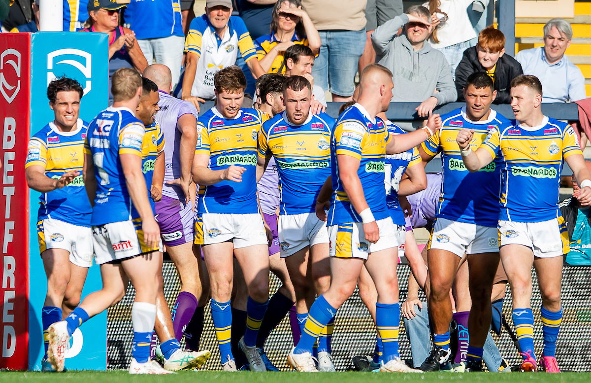 Leeds Rhinos side celebrate scoring a try