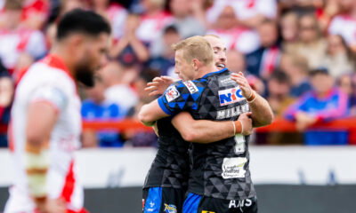 Hull KR v Leeds Rhinos as Lachlan Miller celebrates scoring a try
