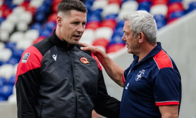 Wakefield Trinity boss Daryl Powell talks to Catalans coach Joel Tomkins