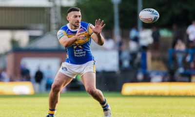 Leeds Rhinos star Jake Connor passing the ball