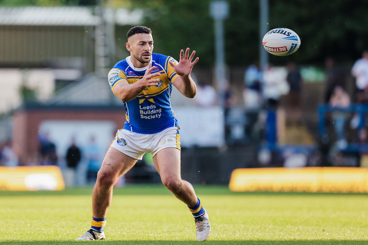 Leeds Rhinos star Jake Connor passing the ball