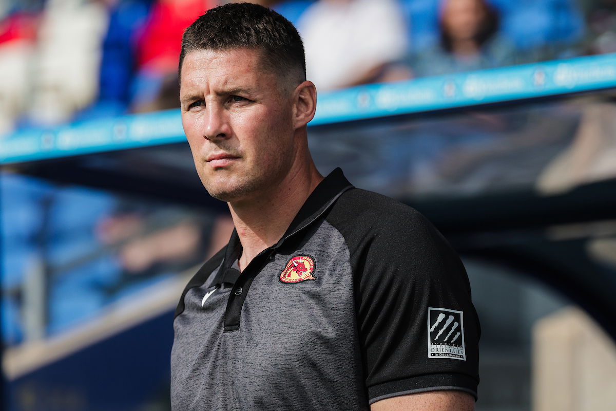 Catalans Dragons boss Joel Tomkins on the sidelines
